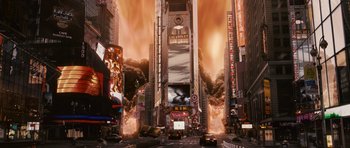 Movie still from “Knowing” (2009), directed by Alex Proyas – A city street with cars driving down the road; Extreme Wide shot, High angle