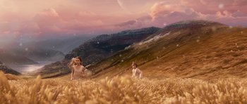 Movie still from “Knowing” (2009), directed by Alex Proyas – Two young children are playing in a field of wheat; Extreme Wide shot, High angle