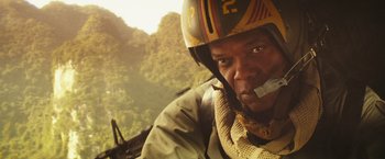 Movie still from “Kong: Skull Island” (2017), directed by Jordan Vogt-Roberts – A person wearing a helmet; Close Up shot, Low angle