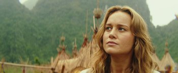 Movie still from “Kong: Skull Island” (2017), directed by Jordan Vogt-Roberts – A person looking at the camera; Close Up shot, Low angle