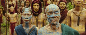 Movie still from “Kong: Skull Island” (2017), directed by Jordan Vogt-Roberts – A group of people standing next to each other; Medium shot, High angle