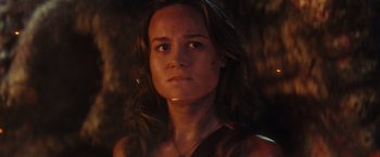Movie still from “Kong: Skull Island” (2017), directed by Jordan Vogt-Roberts – A person with long brown hair; Close Up shot, Over the shoulder angle