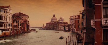 Movie still from “Lara Croft: Tomb Raider” (2001), directed by Simon West – A large body of water near a large city; Extreme Wide shot, High angle