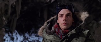 Movie still from “Lara Croft: Tomb Raider” (2001), directed by Simon West – A person wearing a jacket; Close Up shot, Low angle