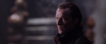 Movie still from “Lara Croft: Tomb Raider” (2001), directed by Simon West – A person wearing a jacket; Close Up shot, Over the shoulder angle