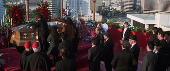 Movie still from “Last Action Hero” (1993), directed by John McTiernan – A group of people standing on top of a red carpet; Wide shot, High angle