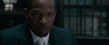 Movie still from “Law Abiding Citizen” (2009), directed by F. Gary Gray – A person wearing a suit and tie; Close Up shot, High angle