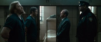 Movie still from “Law Abiding Citizen” (2009), directed by F. Gary Gray – Two men standing in front of each other in front of a bunk bed; Medium shot, Over the shoulder angle