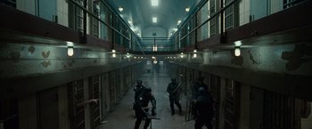 Movie still from “Law Abiding Citizen” (2009), directed by F. Gary Gray – A group of people in a jail cell; Wide shot, High angle