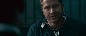 Movie still from “Law Abiding Citizen” (2009), directed by F. Gary Gray – A person wearing a jacket; Close Up shot, Over the shoulder angle