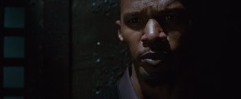 Movie still from “Law Abiding Citizen” (2009), directed by F. Gary Gray – A man's face in the dark; Close Up shot, High angle