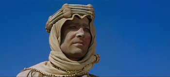 Movie still from “Lawrence of Arabia” (1962), directed by David Lean – A person wearing a hat; Close Up shot, Low angle