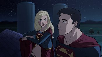 Movie still from “Legion of Super-Heroes” (2023), directed by Jeff Wamester – A man and a woman are standing next to each other; Medium shot, Over the shoulder angle