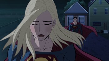 Movie still from “Legion of Super-Heroes” (2023), directed by Jeff Wamester – A woman with long blonde hair and a man in a red and blue cape; Medium shot, Over the shoulder angle