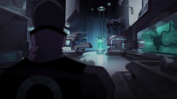 Movie still from “Legion of Super-Heroes” (2023), directed by Jeff Wamester – An image of a man in a room with a lot of wires hanging from the ceiling; Extreme Wide shot, Low angle