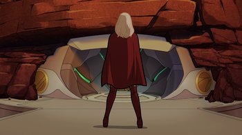 Movie still from “Legion of Super-Heroes” (2023), directed by Jeff Wamester – A woman standing in front of an entrance to a building; Wide shot, Low angle