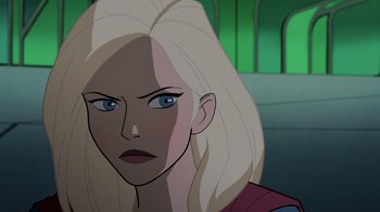 Movie still from “Legion of Super-Heroes” (2023), directed by Jeff Wamester – A woman with blonde hair and blue eyes; Close Up shot, Over the shoulder angle