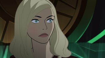 Movie still from “Legion of Super-Heroes” (2023), directed by Jeff Wamester – A woman with blonde hair and blue eyes; Close Up shot, Over the shoulder angle