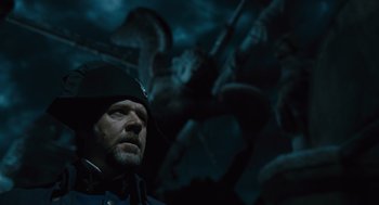 Movie still from “Les Misérables” (2012), directed by Tom Hooper – A man with a beard wearing a black hat; Close Up shot, Low angle