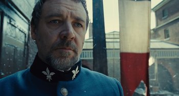 Movie still from “Les Misérables” (2012), directed by Tom Hooper – A person wearing a uniform; Close Up shot, Over the shoulder angle