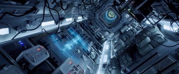 Movie still from “Life” (2017), directed by Daniel Espinosa – An overhead view of a space station with lights; Extreme Wide shot, Overhead angle