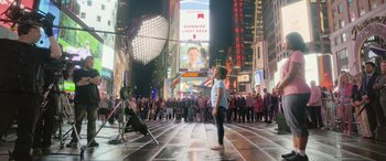 Movie still from “Life” (2017), directed by Daniel Espinosa – A woman standing in the middle of a city street; Extreme Wide shot, Low angle