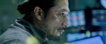 Movie still from “Life” (2017), directed by Daniel Espinosa – A person with a beard; Close Up shot, Low angle