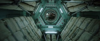 Movie still from “Life” (2017), directed by Daniel Espinosa – Looking up at the inside of a space station; Wide shot, Overhead angle