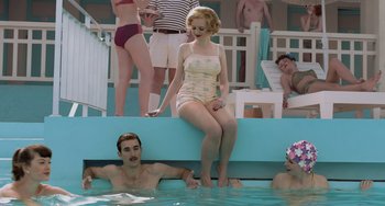 Movie still from “Life of Pi” (2012), directed by Ang Lee – A group of people in a swimming pool; Wide shot, High angle