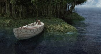 Movie still from “Life of Pi” (2012), directed by Ang Lee – A man is sitting on a boat in the middle of the water; Extreme Wide shot, High angle