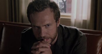 Movie still from “Life of Pi” (2012), directed by Ang Lee – A person with his hands clasped together; Close Up shot, Over the shoulder angle