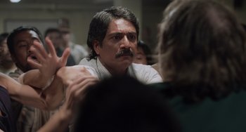 Movie still from “Life of Pi” (2012), directed by Ang Lee – A person talking to another person; Close Up shot, Over the shoulder angle