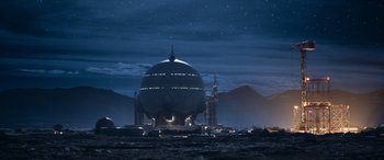 Movie still from “Lightyear” (2022), directed by Angus MacLane – A large building in the middle of the ocean; Extreme Wide shot, Low angle