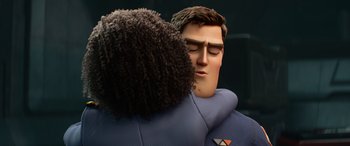 Movie still from “Lightyear” (2022), directed by Angus MacLane – A man and a woman embracing each other; Close Up shot, Over the shoulder angle