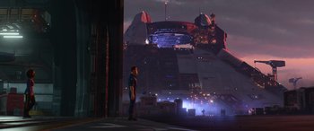 Movie still from “Lightyear” (2022), directed by Angus MacLane – A man standing on the side of a building; Extreme Wide shot, Low angle