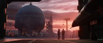 Movie still from “Lightyear” (2022), directed by Angus MacLane – Two people standing in front of an airplane in the sunset; Extreme Wide shot, Low angle