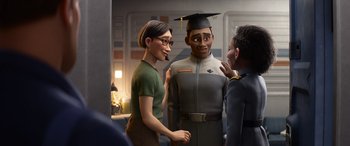 Movie still from “Lightyear” (2022), directed by Angus MacLane – A man and a woman standing next to each other; Medium shot, Over the shoulder angle