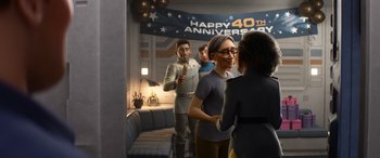 Movie still from “Lightyear” (2022), directed by Angus MacLane – A group of people standing in front of a room; Medium shot, Over the shoulder angle