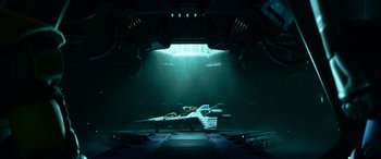 Movie still from “Lightyear” (2022), directed by Angus MacLane – An image of a spaceship in a dark space setting; Extreme Wide shot, High angle