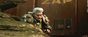 Movie still from “Lightyear” (2022), directed by Angus MacLane – A toy figure of an older man with a white beard; Medium shot, Low angle