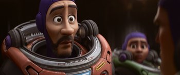 Movie still from “Lightyear” (2022), directed by Angus MacLane – A character's face in a space suit; Close Up shot, Over the shoulder angle