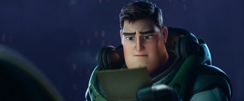 Movie still from “Lightyear” (2022), directed by Angus MacLane – A character holding a piece of paper; Close Up shot, Over the shoulder angle