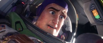 Movie still from “Lightyear” (2022), directed by Angus MacLane – The head of buzz lightyear in a space suit; Close Up shot, Low angle