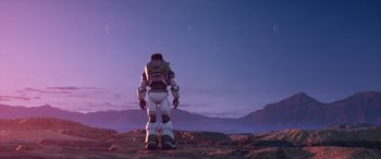 Movie still from “Lightyear” (2022), directed by Angus MacLane – An image of a man standing on a hill at night; Extreme Wide shot, Low angle