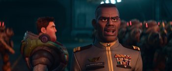 Movie still from “Lightyear” (2022), directed by Angus MacLane – A person in a uniform; Close Up shot, Over the shoulder angle