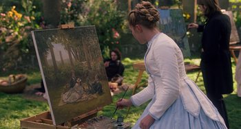 Movie still from “Little Women” (2019), directed by Greta Gerwig – A woman is painting a picture in a garden; Wide shot, Over the shoulder angle