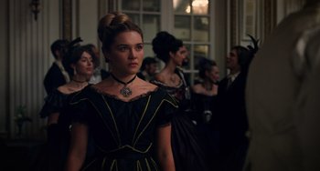 Movie still from “Little Women” (2019), directed by Greta Gerwig – A group of people dressed in victorian clothing; Medium shot, Low angle