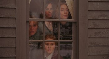 Movie still from “Little Women” (2019), directed by Greta Gerwig – A group of young people looking out of a window; Medium shot, High angle