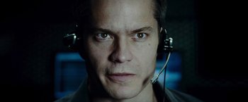 Movie still from “Live Free or Die Hard” (2007), directed by Len Wiseman – A person wearing a headset; Close Up shot, Low angle