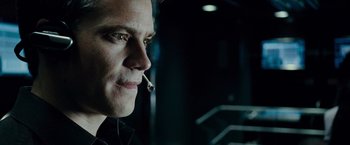 Movie still from “Live Free or Die Hard” (2007), directed by Len Wiseman – A person with a cigarette in his mouth; Close Up shot, Low angle